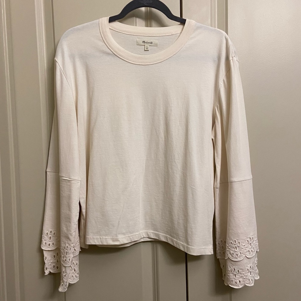 White long sleeve top